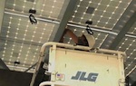 A California college has shaved $650,000 off of its energy expenses with a few strategic moves, including solar panels that double as cover for parking and Web-based software for micromanaging lighting and mechanical energy use.