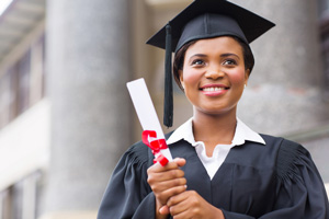 african american graduate holding diploma