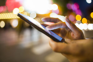 closeup of person texting on mobile phone