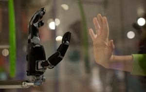 robot hand and human hand