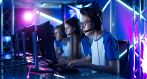 row of students gaming on computers