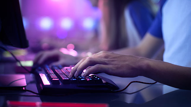 closeup of esports gamer on computer