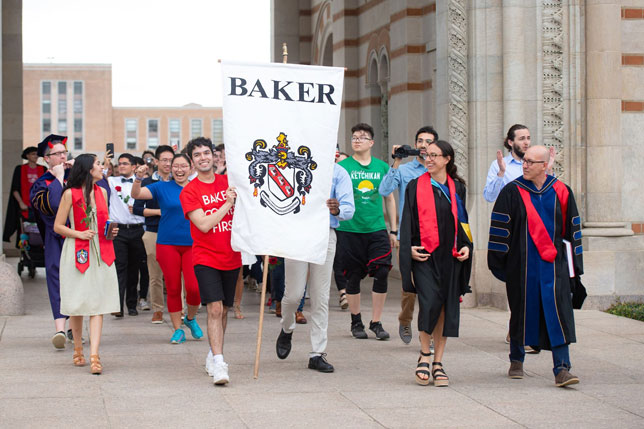 Baker College seniors take the traditional walk the Sallyport during a mock graduation at Rice University on Mar. 13.
