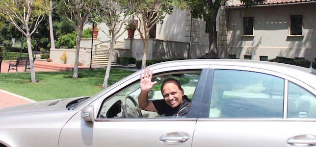 Manoj Chitre greets colleagues with a wave