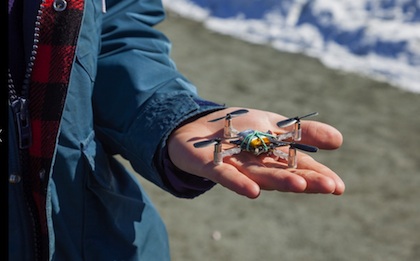 Dartmouth students write code for nanocopters and control them with a Leap Motion controller. Photo by Martin Grant.