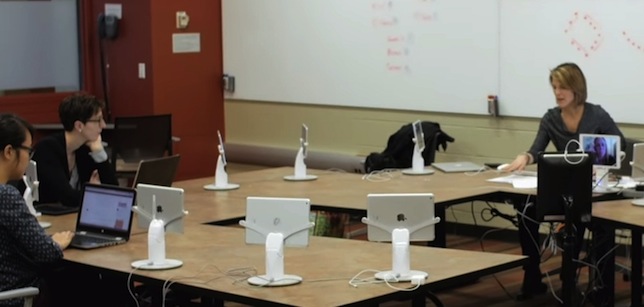 A doctoral program at Michigan State University has begun experimenting with the use of robots to pull on-campus and off-campus students closer together in class.