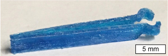 This MIT research project demonstrated the chemical versatility of 3D printing with cellulose by producing a pair of surgical tweezers with antimicrobial functionality to make them sterile. Courtesy of the MIT researchers.