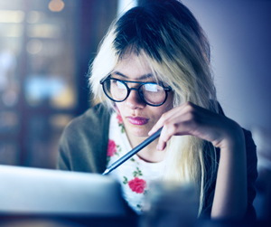 college student working on computer