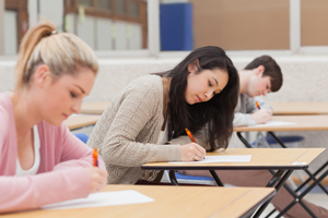 college students taking an exam