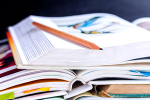 stack of open textbooks