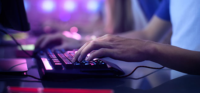 closeup of esports gamer on computer