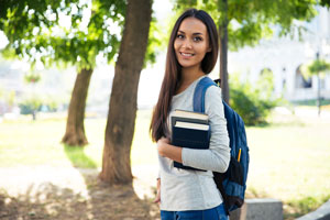 college student carrying books