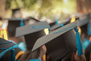 closeup of graduation caps