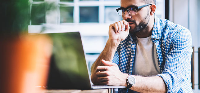 man working on laptop