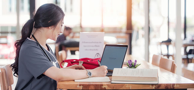 student working on computer