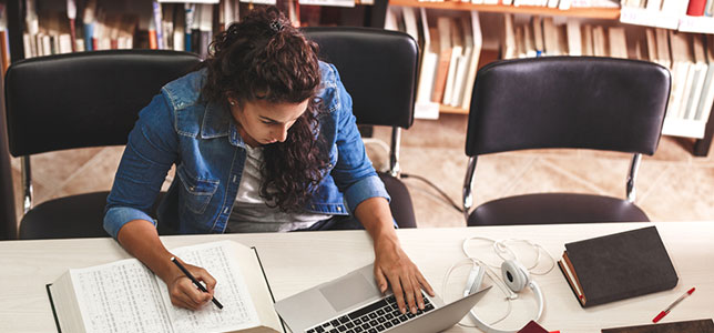 woman studying on computer