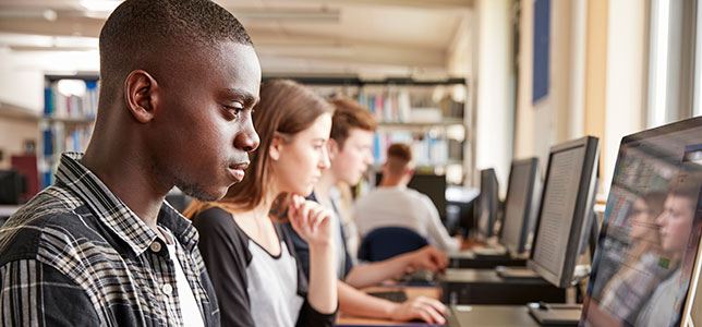 students at row of computers