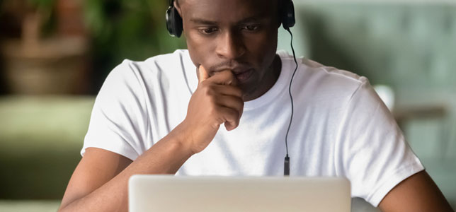 serious college student working on computer