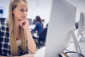 student working on computer