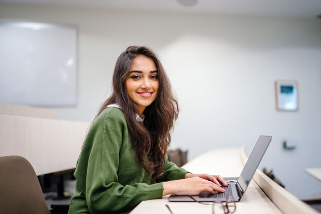 student working on laptop