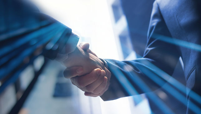 Businessmen making handshake