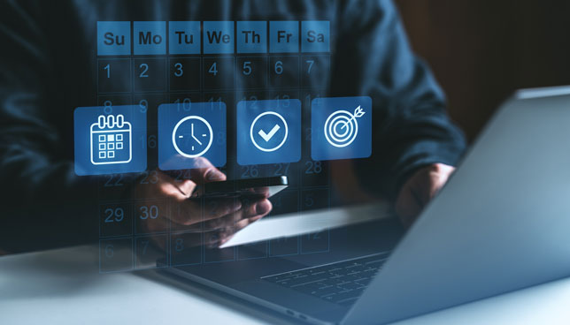 laptop with digital productivity and calendar symbols