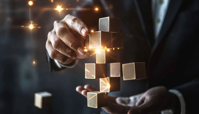 businessman juggling cubes