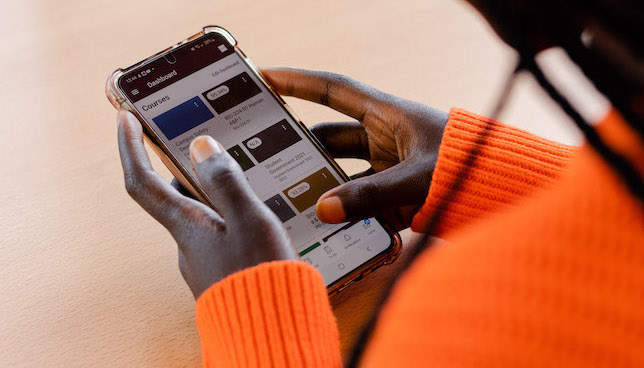 closeup of hands using smart phone