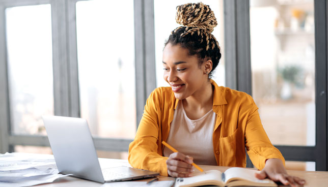 young woman studying remotely