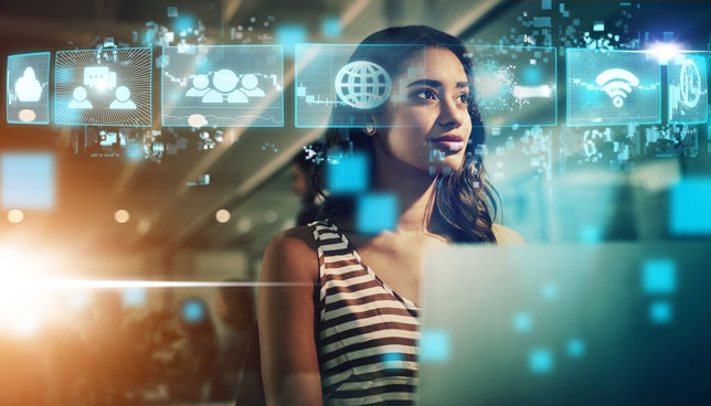 woman surrounded by virtual hologram icons