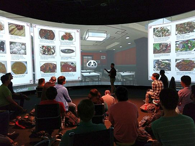 Rahul Divekar, a Rensselaer computer science graduate student, demonstrates an AI-assisted Mandarin Chinese language learning aid under development at the university.