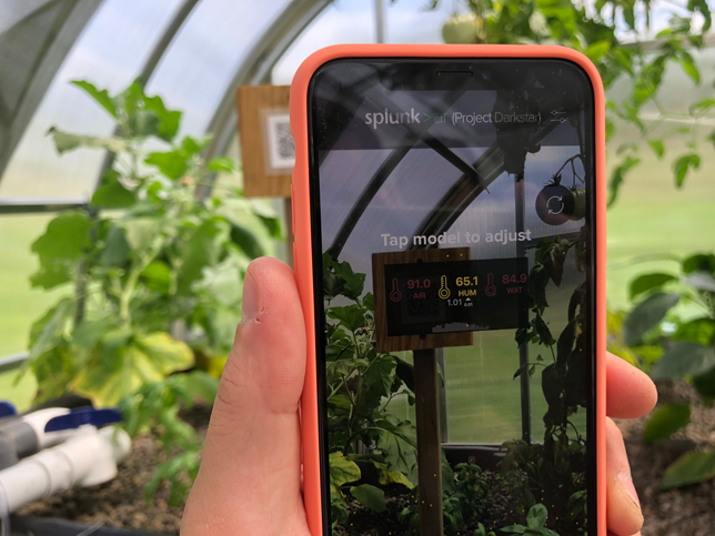 Students can use augmented reality to visualize water levels and other measurements throughout the aquaponics system. 