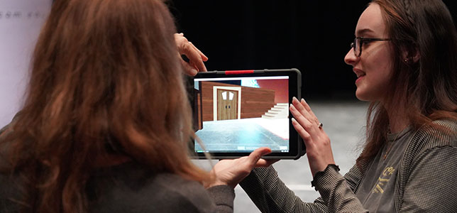 An AR set design app allows Husson University theater students to visualize a set on stage before construction begins.