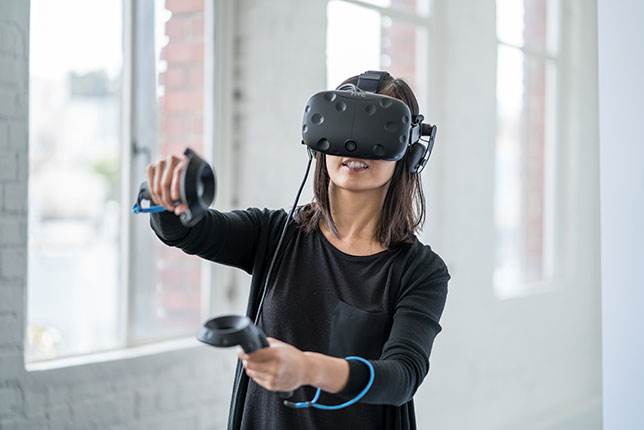 woman using virtual reality gear